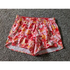 Avia Women's Floral Athletic Shorts in Coral, Yellow, White